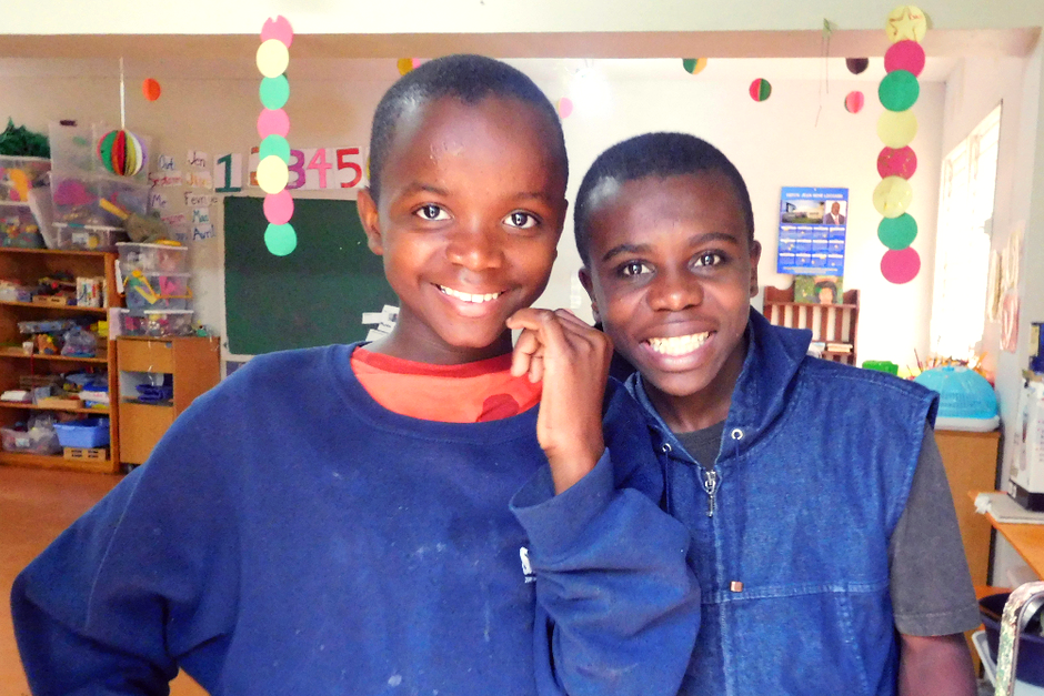 Two boys in a classroom in Haiti